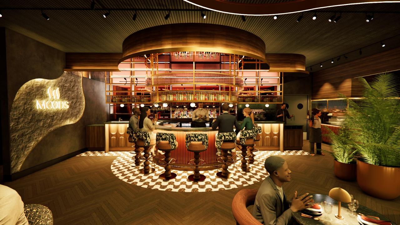 Interior material study — warm timber panelling, brass detailing and stone surfaces under low, considered lighting.